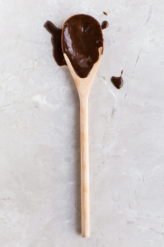 dirty wooden spoon, covered in brownie batter